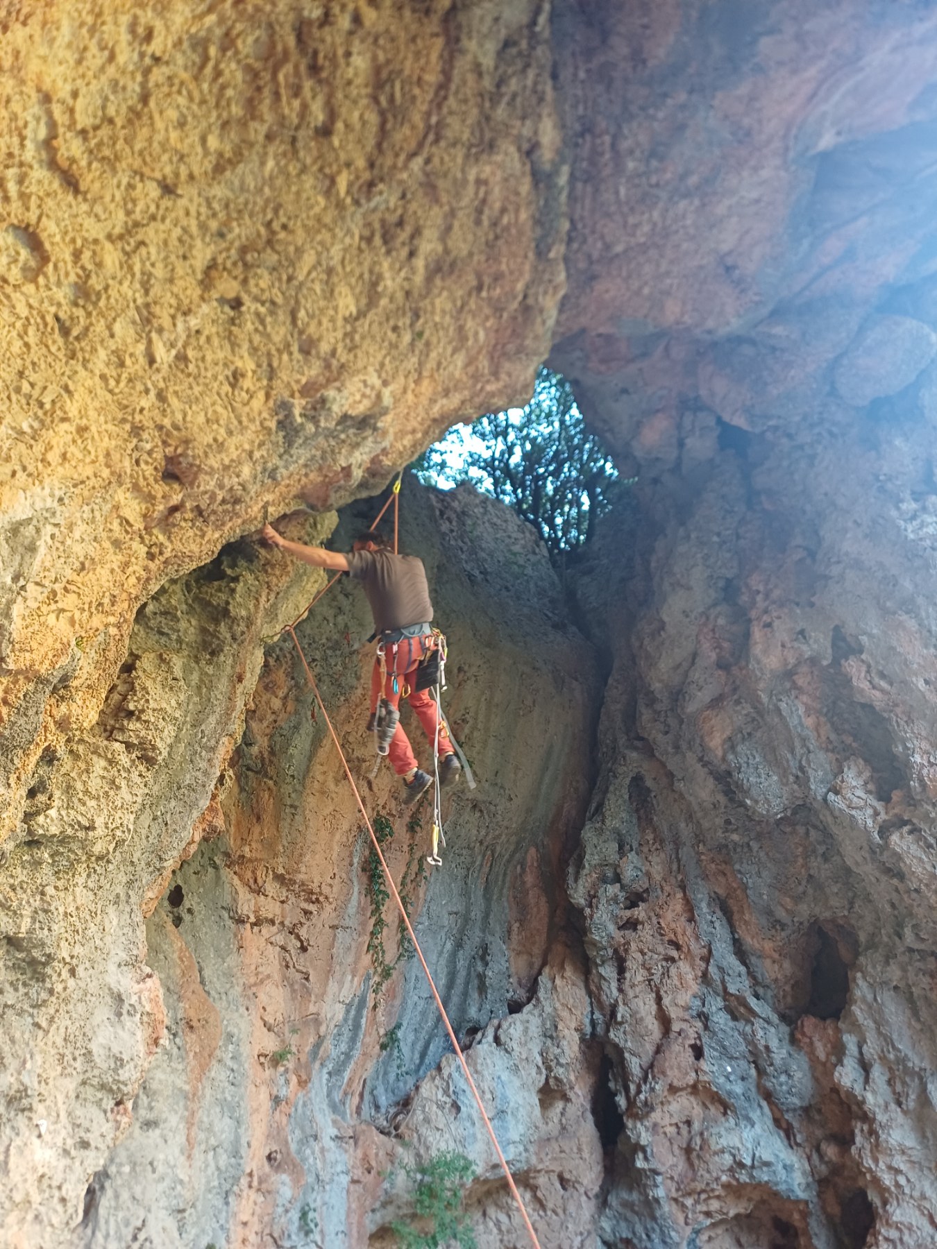 Jim bolting a new route at sector Pipistrello Cave